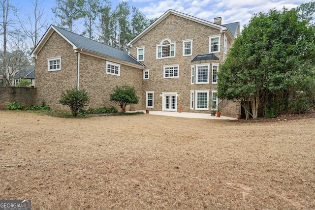 256 Allie Dr, Mcdonough, GA 30252 - rear view of property with a patio and french doors