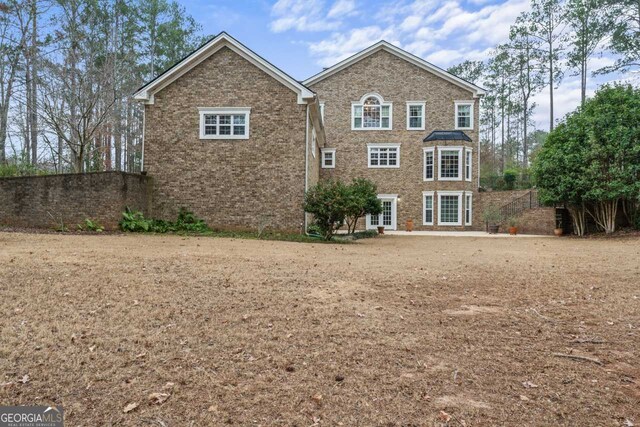 256 Allie Dr, Mcdonough, GA 30252 - view of front of property featuring brick siding and fence