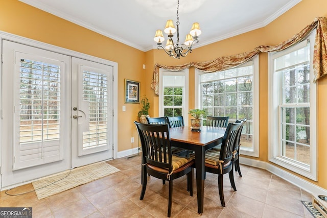 256 Allie Dr, Mcdonough, GA 30252 - dining room with crown molding, baseboards, a notable chandelier, french doors, and light tile patterned floors