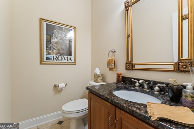 256 Allie Dr, Mcdonough, GA 30252 - half bathroom featuring tile patterned floors, toilet, baseboards, and vanity