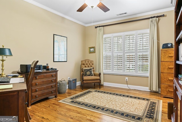 256 Allie Dr, Mcdonough, GA 30252 - home office with a ceiling fan, wood finished floors, visible vents, ornamental molding, and a healthy amount of sunlight