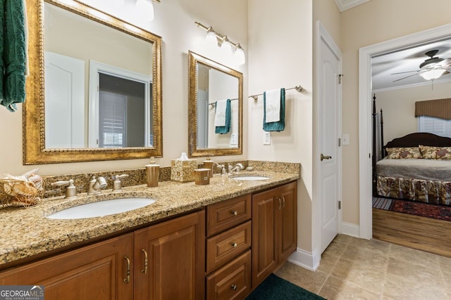 256 Allie Dr, Mcdonough, GA 30252 - ensuite bathroom featuring ensuite bathroom, crown molding, ceiling fan, and a sink