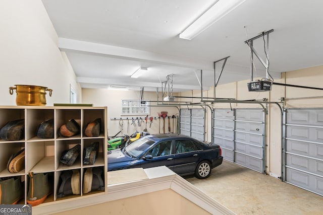 256 Allie Dr, Mcdonough, GA 30252 - garage featuring a garage door opener