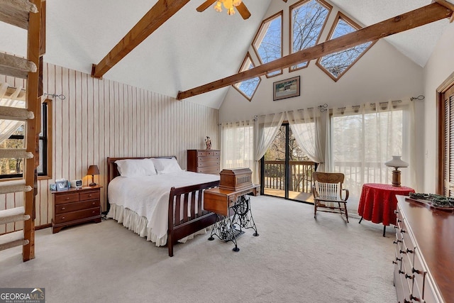 bedroom with access to exterior, beam ceiling, light colored carpet, and ceiling fan