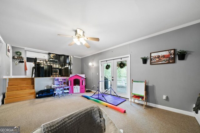 interior space with access to exterior, ornamental molding, french doors, and ceiling fan