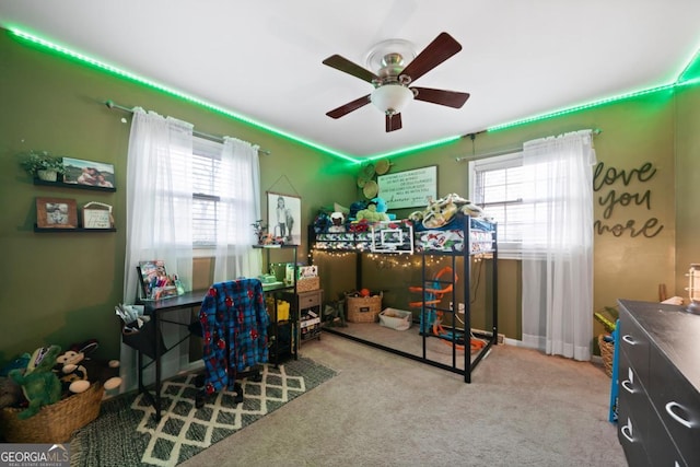 carpeted bedroom featuring ceiling fan