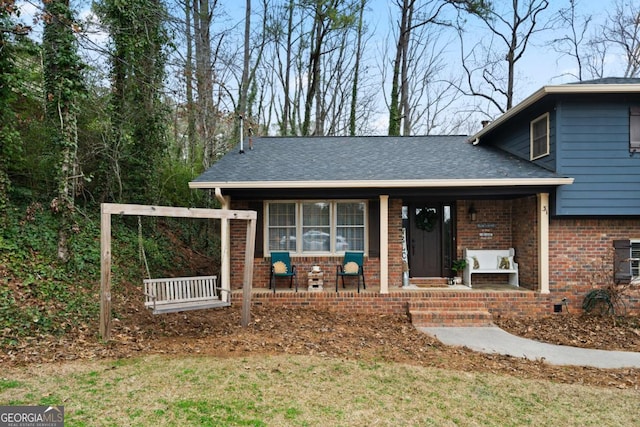 split level home featuring covered porch