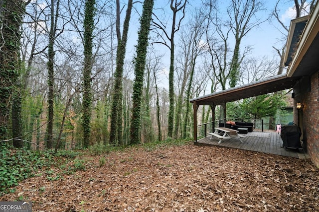 view of yard with a deck
