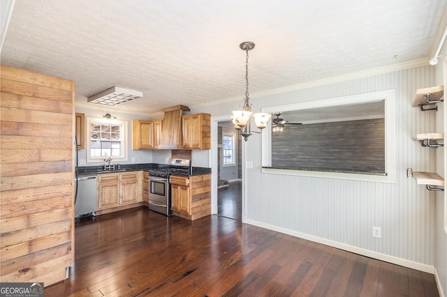 kitchen featuring hanging light fixtures, stainless steel appliances, a textured ceiling, dark hardwood / wood-style flooring, and custom exhaust hood