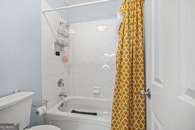 bathroom with shower / bathtub combination with curtain and toilet