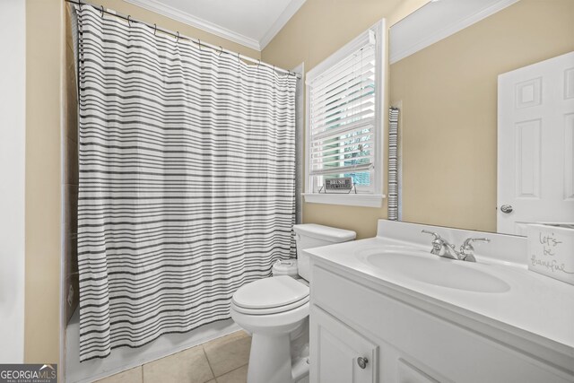 bathroom featuring tile patterned flooring, toilet, vanity, ornamental molding, and shower / bath combo with shower curtain