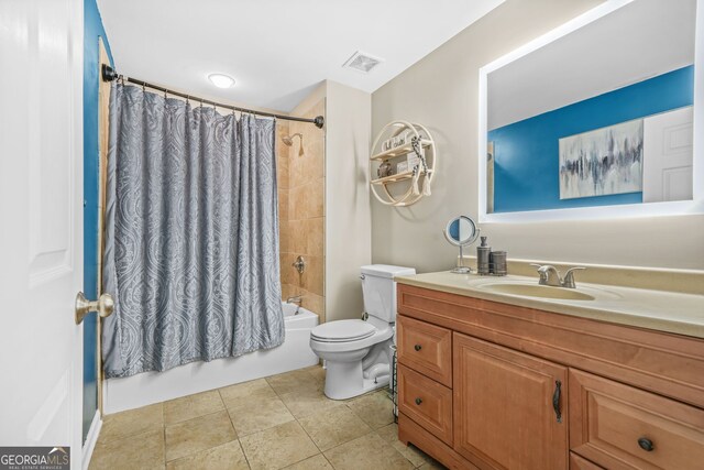 full bath with toilet, shower / tub combo, vanity, visible vents, and tile patterned floors