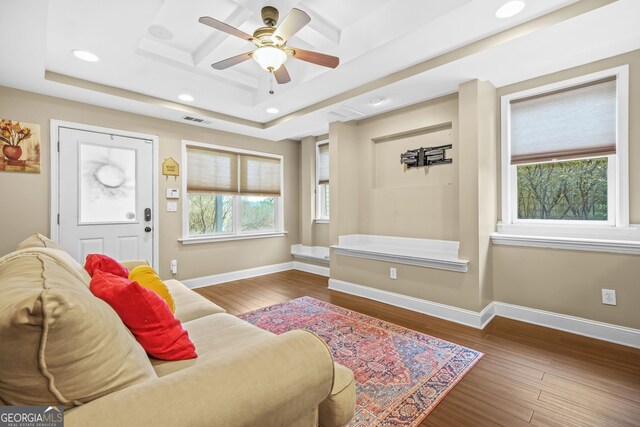 living room featuring baseboards, visible vents, a ceiling fan, wood finished floors, and recessed lighting