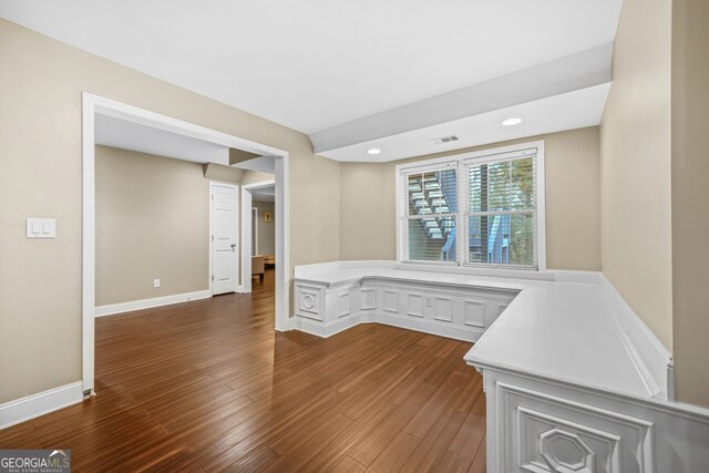 interior space with recessed lighting, visible vents, dark wood finished floors, and baseboards