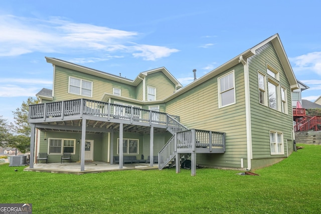 back of house featuring a deck, a patio, central AC, stairway, and a lawn