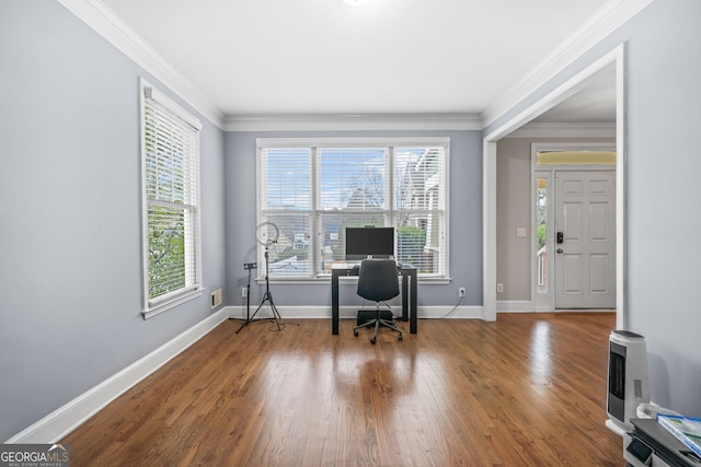 office area featuring ornamental molding, wood finished floors, and baseboards