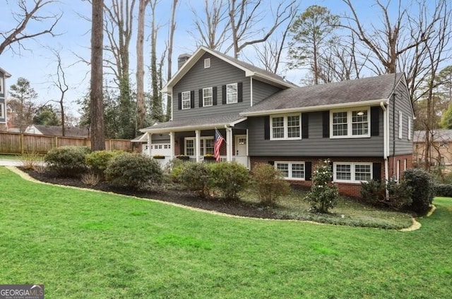 view of front facade featuring a garage and a front yard