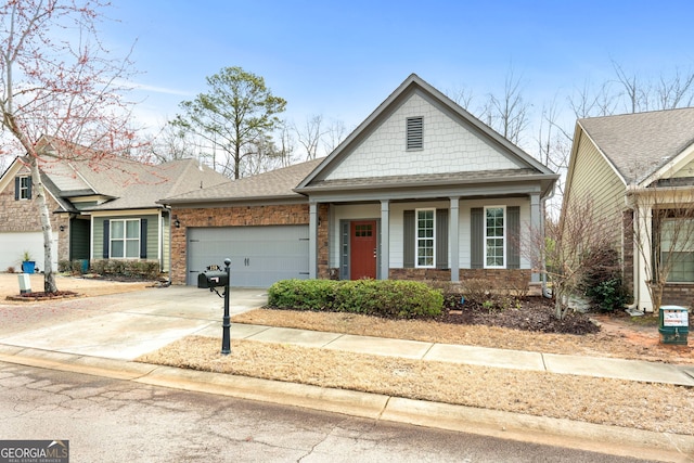 view of front of house featuring a garage and concrete driveway