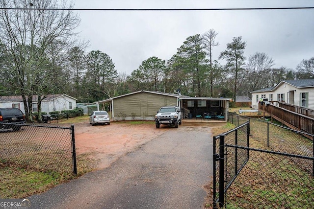 manufactured / mobile home featuring a carport