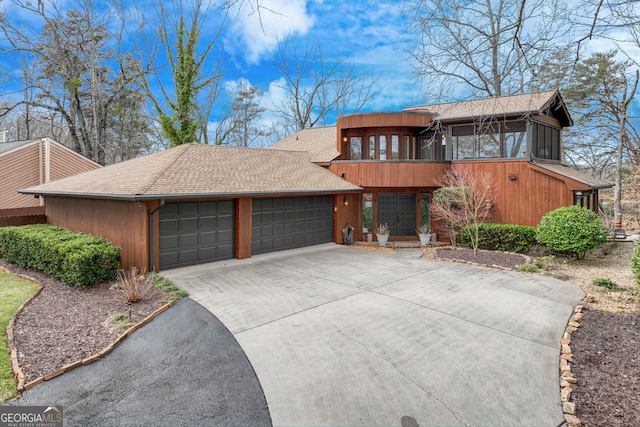 view of front of property with a garage