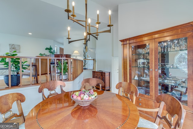 dining area with a high ceiling