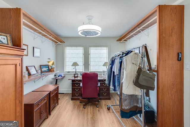 office space with light hardwood / wood-style floors