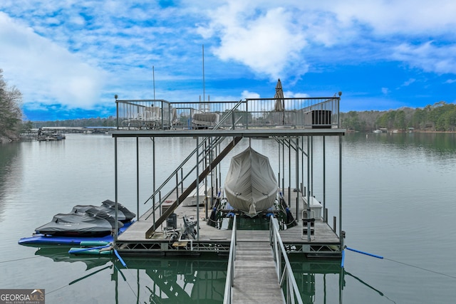 dock area with central AC unit and a water view