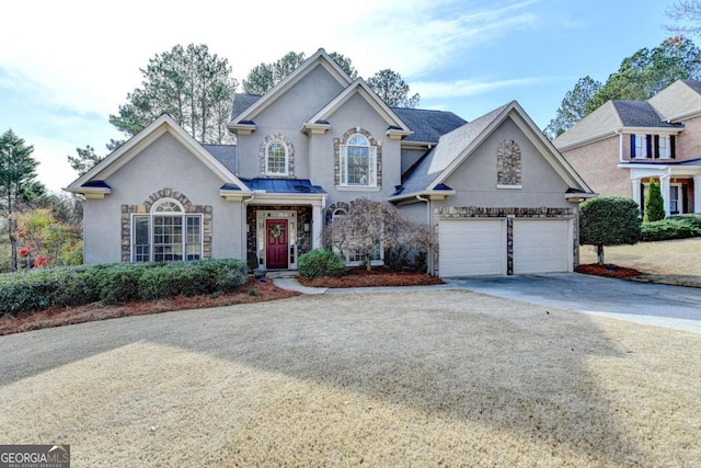 front of property with a garage