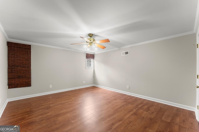 unfurnished room with hardwood / wood-style flooring, ceiling fan, and ornamental molding