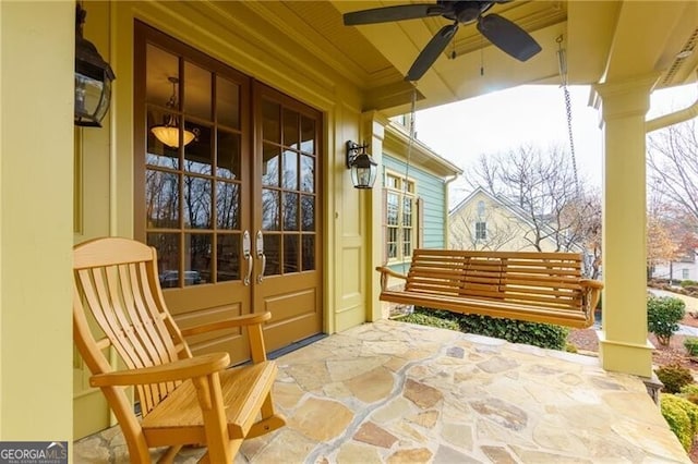 view of front of house with a porch, driveway, and an attached garage