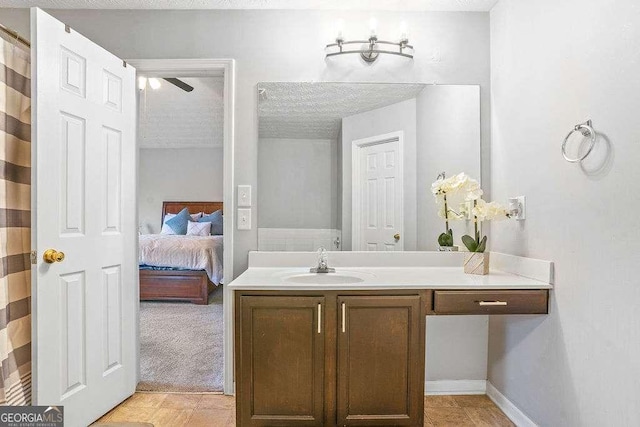 bathroom featuring vanity and a textured ceiling