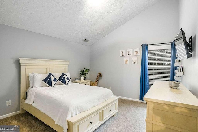 carpeted bedroom featuring lofted ceiling and a textured ceiling