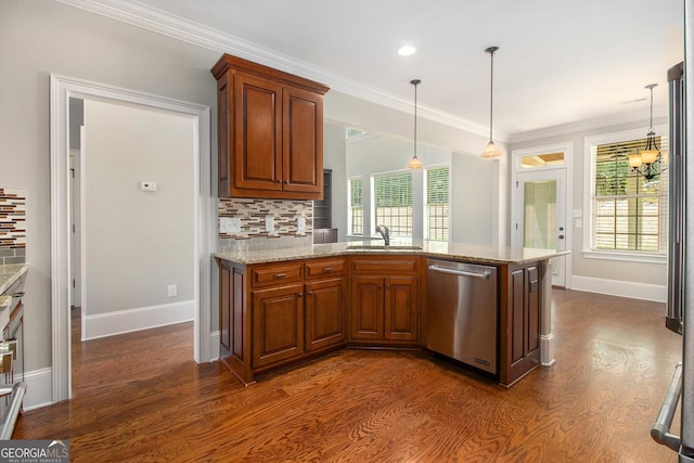 kitchen with stainless steel dishwasher, a sink, dark wood-type flooring, decorative backsplash, and crown molding