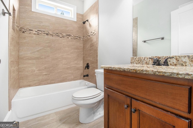 full bathroom with toilet,  shower combination, and vanity