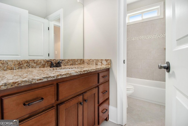 full bath with vanity, tile patterned floors, toilet, and tub / shower combination