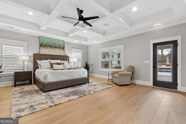 bedroom with coffered ceiling, crown molding, beamed ceiling, and light wood-type flooring