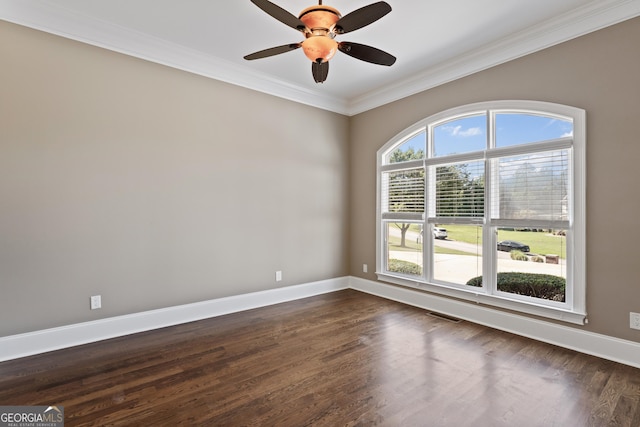 unfurnished room featuring crown molding, ceiling fan, and dark hardwood / wood-style floors