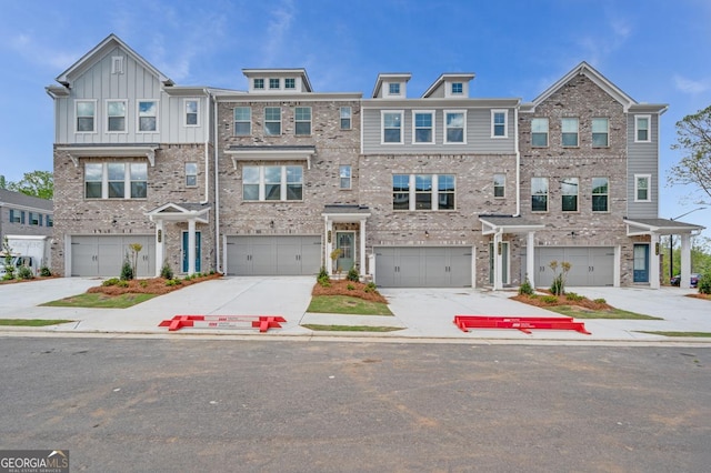 3812 Thatcher Dr SW, Marietta, GA 30008 - townhome / multi-family property with brick siding, driveway, and a garage