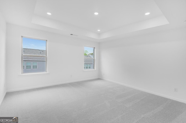 3812 Thatcher Dr SW, Marietta, GA 30008 - unfurnished room with carpet flooring, a tray ceiling, and recessed lighting
