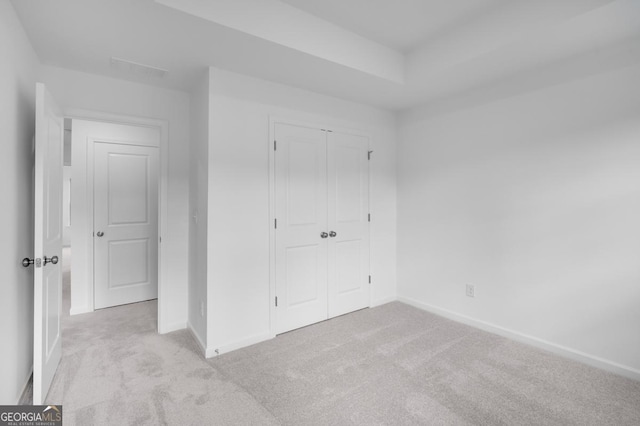 3812 Thatcher Dr SW, Marietta, GA 30008 - unfurnished bedroom featuring a closet, carpet flooring, and baseboards