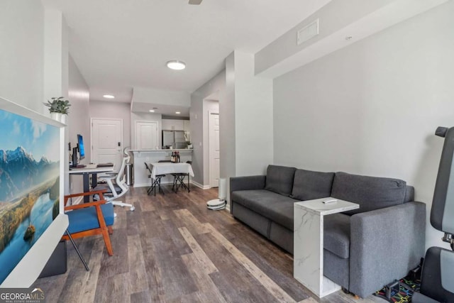 living room with dark wood-type flooring