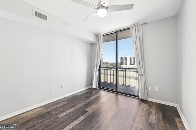 3040 Peachtree Rd NW Unit 613, Atlanta, GA 30305 - empty room featuring dark wood finished floors and ceiling fan