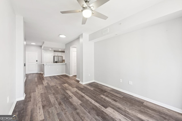 3040 Peachtree Rd NW Unit 613, Atlanta, GA 30305 - unfurnished living room featuring dark wood finished floors, a ceiling fan, and recessed lighting