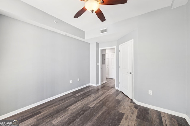 3040 Peachtree Rd NW Unit 613, Atlanta, GA 30305 - unfurnished bedroom with dark wood-style flooring and ceiling fan