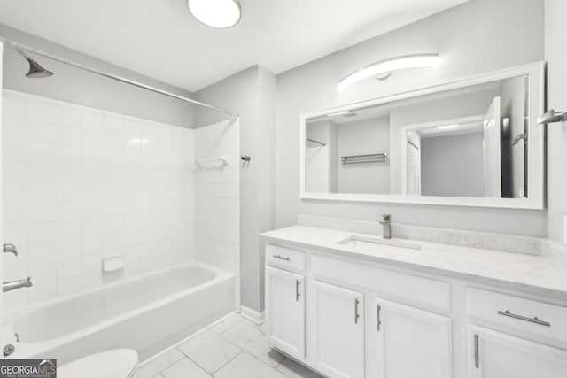 3040 Peachtree Rd NW Unit 613, Atlanta, GA 30305 - full bathroom featuring vanity, bathtub / shower combination, and marble look tile flooring