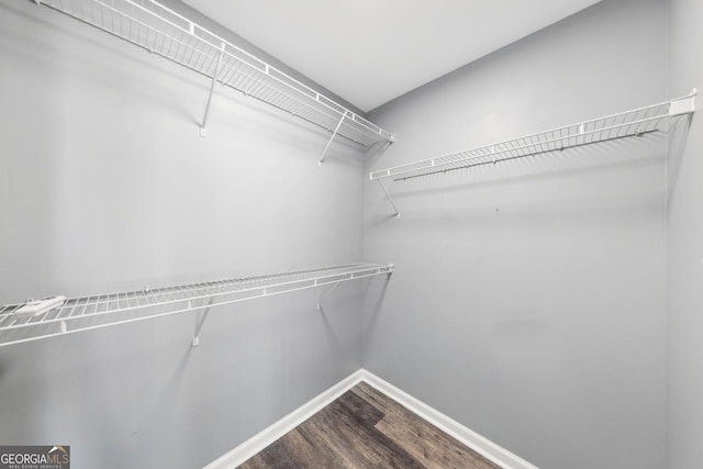 3040 Peachtree Rd NW Unit 613, Atlanta, GA 30305 - walk in closet with dark wood finished floors
