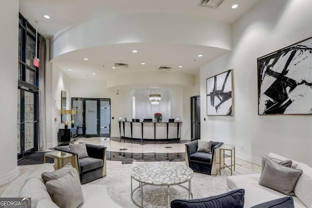 3040 Peachtree Rd NW Unit 613, Atlanta, GA 30305 - lobby with recessed lighting and a towering ceiling