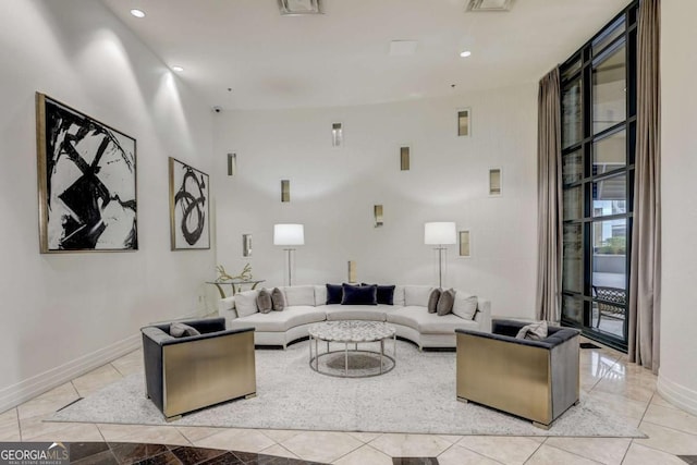 3040 Peachtree Rd NW Unit 613, Atlanta, GA 30305 - living room featuring recessed lighting and light tile patterned flooring