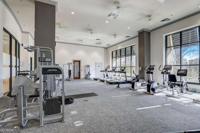 3040 Peachtree Rd NW Unit 613, Atlanta, GA 30305 - exercise room with ornamental molding, carpet floors, and recessed lighting