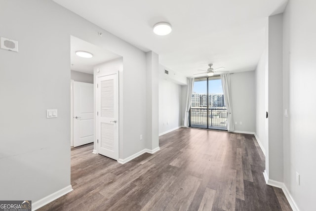 3040 Peachtree Rd NW Unit 613, Atlanta, GA 30305 - unfurnished room featuring dark wood finished floors and a ceiling fan